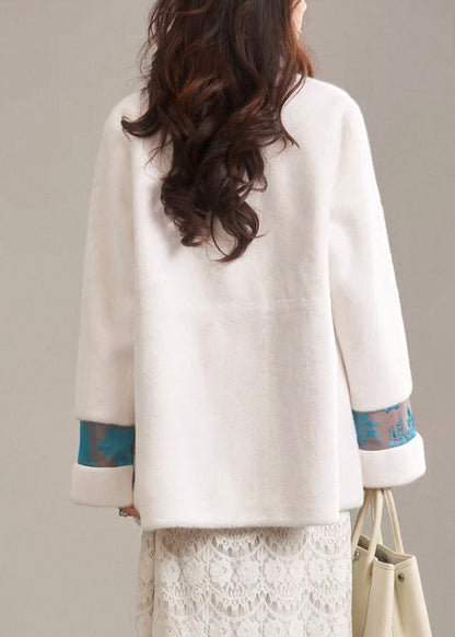 Eleganter beigefarbener Patchwork-Mantel aus Leder und Pelz mit Rundhalsausschnitt für den Winter