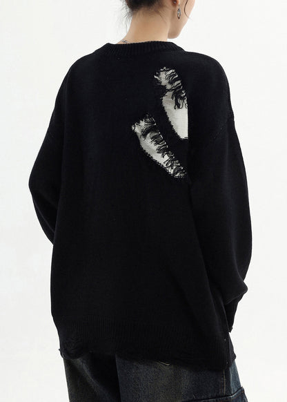 Suéter negro oversize con parches rotos y clase para invierno