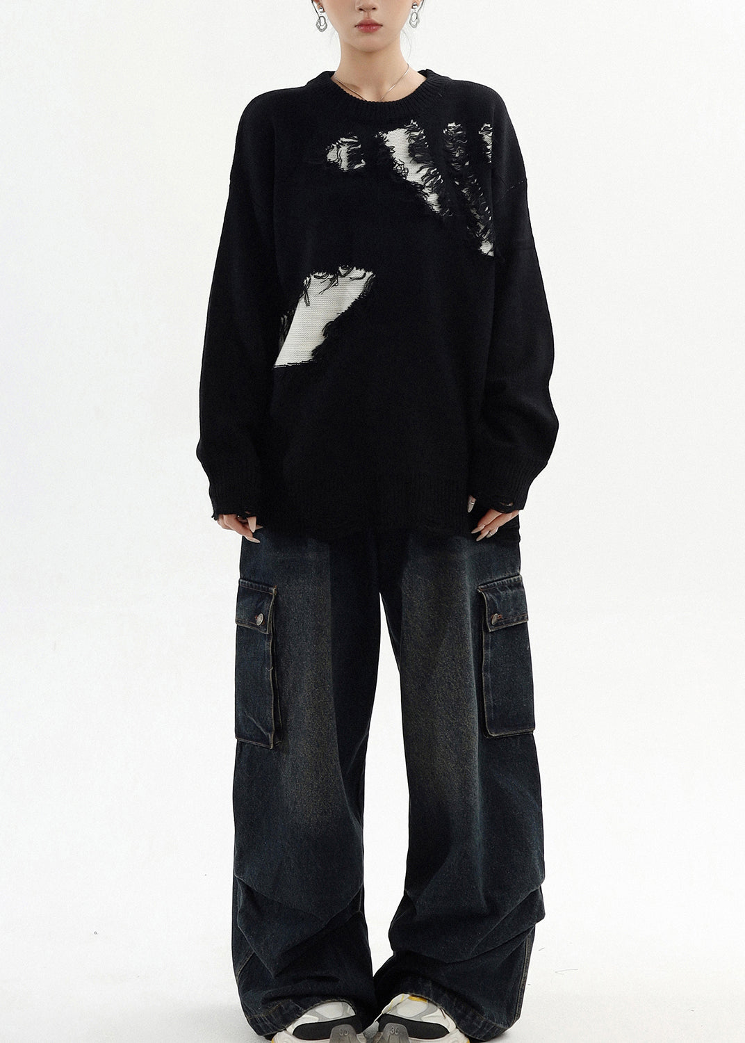 Suéter negro oversize con parches rotos y clase para invierno