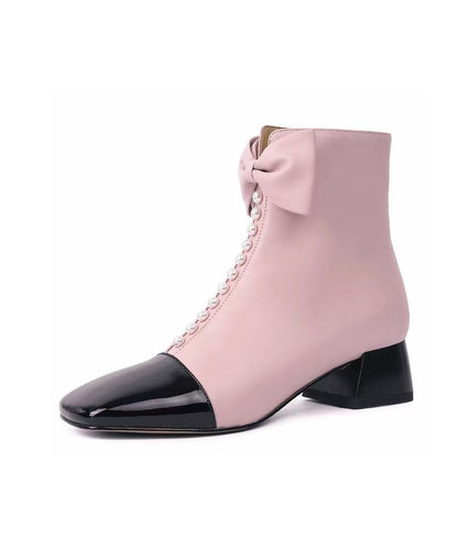 Botas gruesas con cremallera y lazo elegantes de piel de oveja rosa