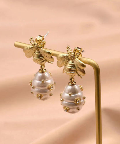 Pendientes colgantes con forma de abeja y perla de circonitas y cobre dorado