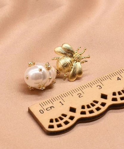 Pendientes colgantes con forma de abeja y perla de circonitas y cobre dorado