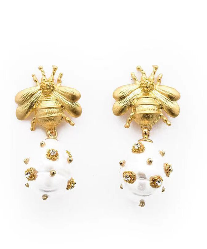Pendientes colgantes con forma de abeja y perla de circonitas y cobre dorado
