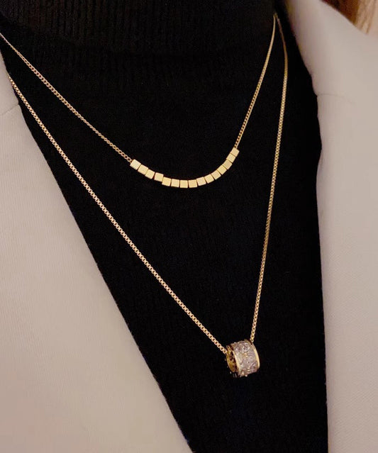 Collar con colgante de doble capa de circonita y acero inoxidable dorado y elegante