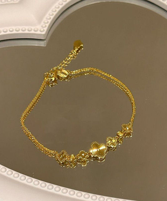 Pulsera elegante con dije de trébol de cuatro hojas y plata de ley dorada