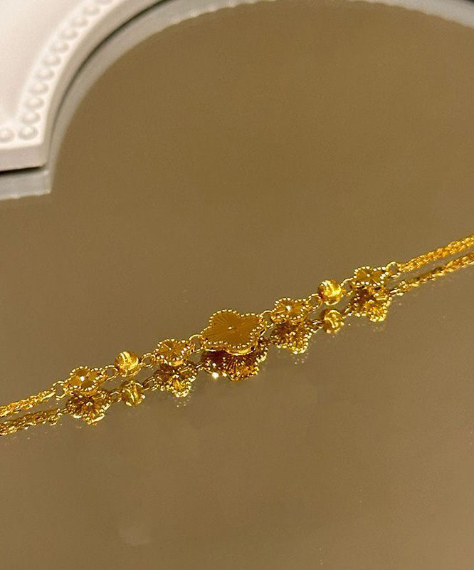 Pulsera elegante con dije de trébol de cuatro hojas y plata de ley dorada