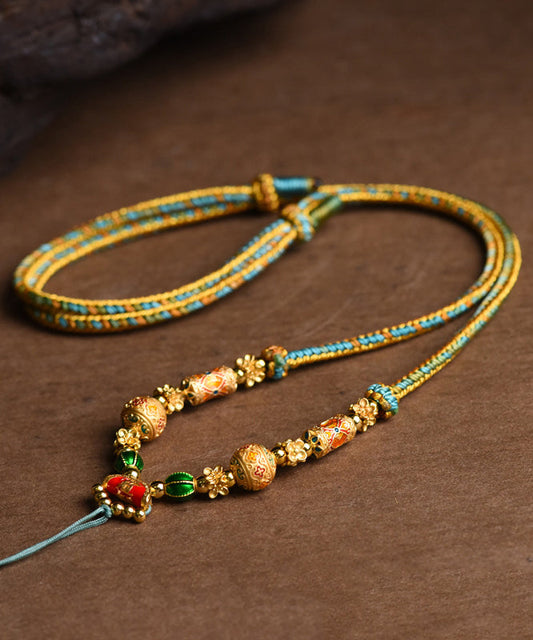 Collar con colgante de borla de plata de ley dorada y elegante