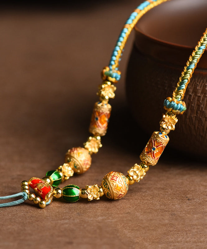 Collar con colgante de borla de plata de ley dorada y elegante