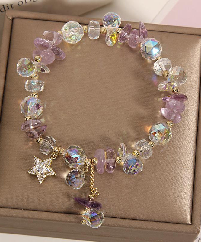 Pulsera elegante de plata de ley con dije de circonitas y cristales dorados en color morado claro