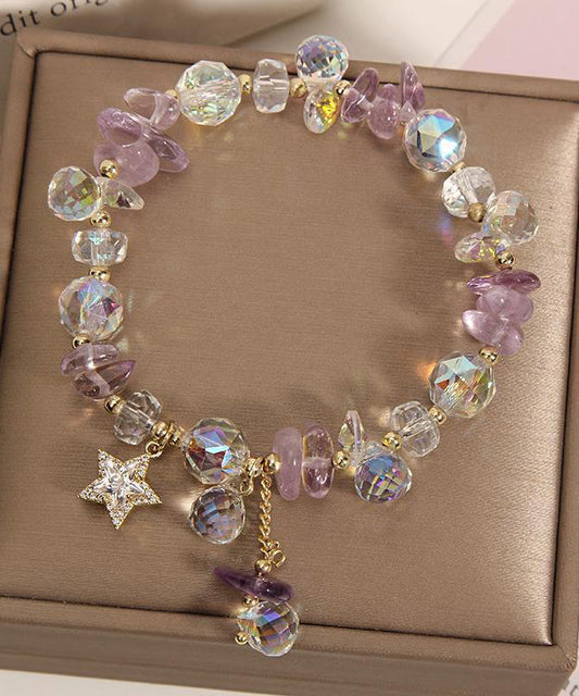 Pulsera elegante de plata de ley con dije de circonitas y cristales dorados en color morado claro