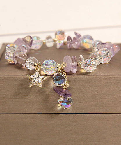 Pulsera elegante de plata de ley con dije de circonitas y cristales dorados en color morado claro