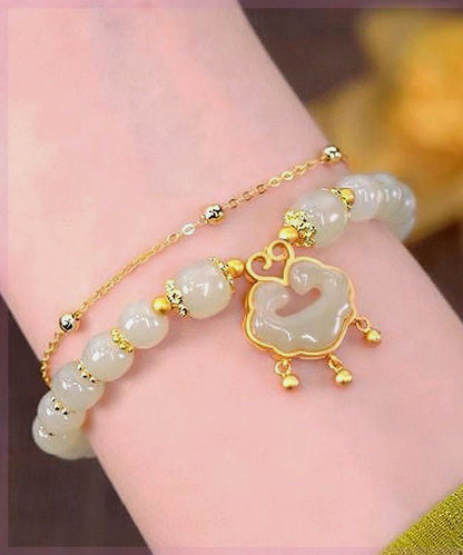 Edles kleines grünes Sterlingsilber-Armband mit Jade-Sicherheitsverschluss und Quaste