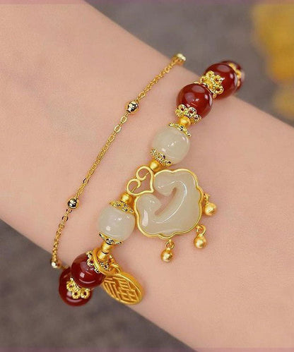 Edles kleines grünes Sterlingsilber-Armband mit Jade-Sicherheitsverschluss und Quaste