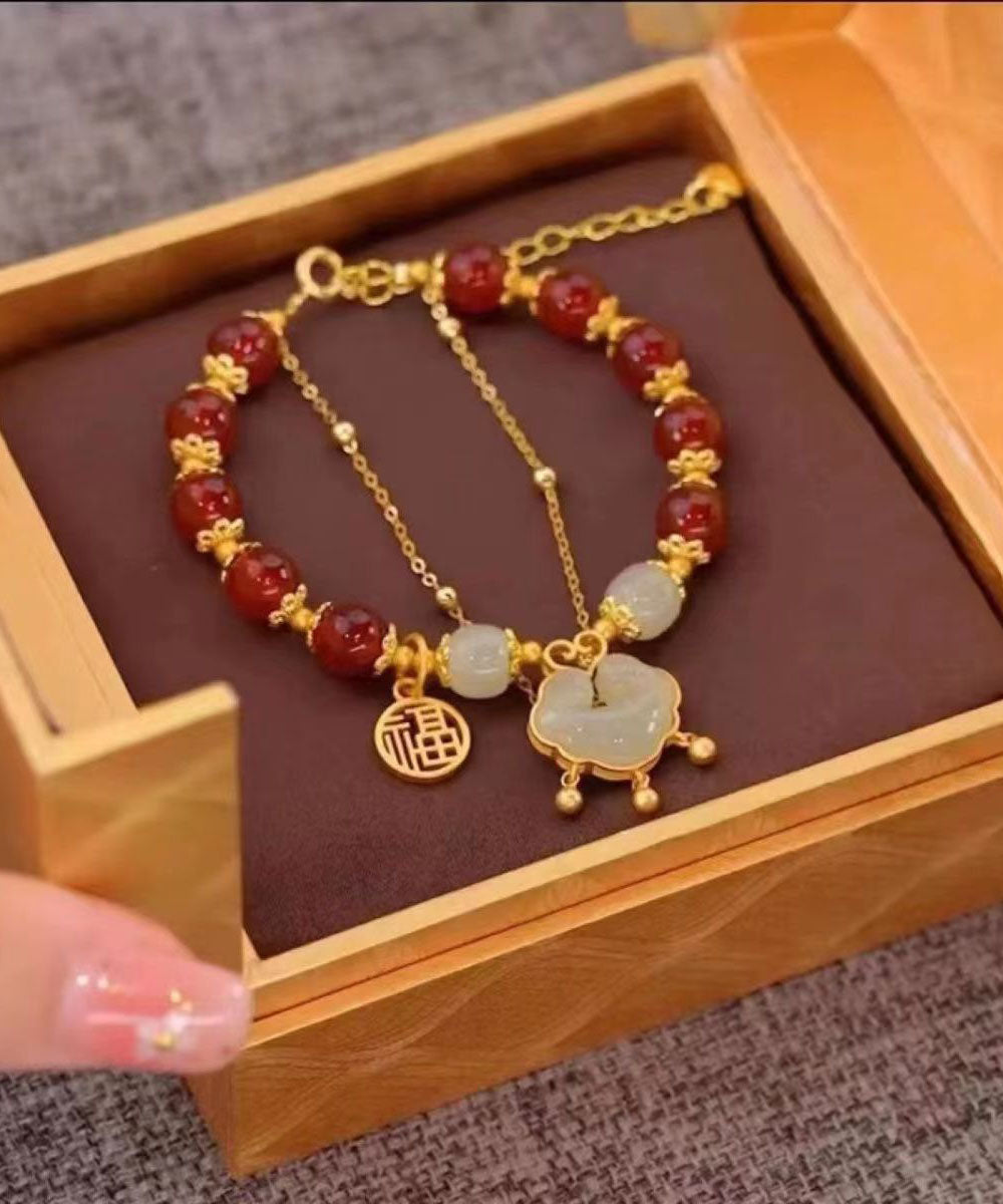 Edles kleines grünes Sterlingsilber-Armband mit Jade-Sicherheitsverschluss und Quaste