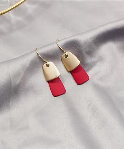Pendientes colgantes elegantes de plata de ley con acabado de pintura metálica de color naranja