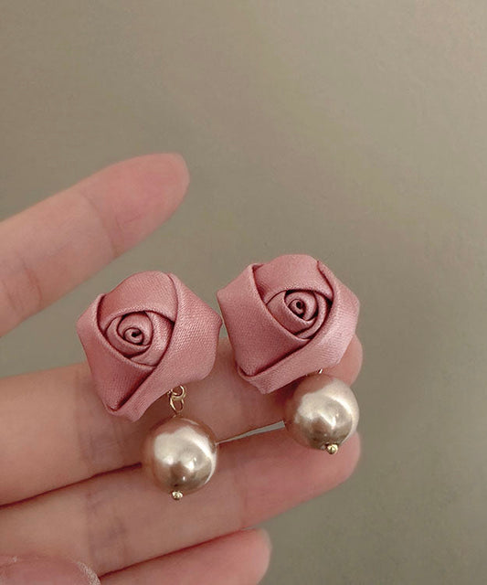 Pendientes colgantes de tela con perla rosa y cobre dorado