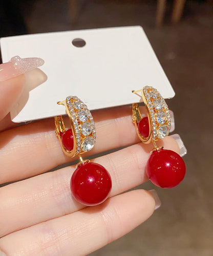 Pendientes elegantes con bola de circonita y perla dorada de cobre rojo
