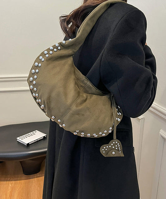 Bolso de mano elegante y duradero de piel sintética con remaches rojos