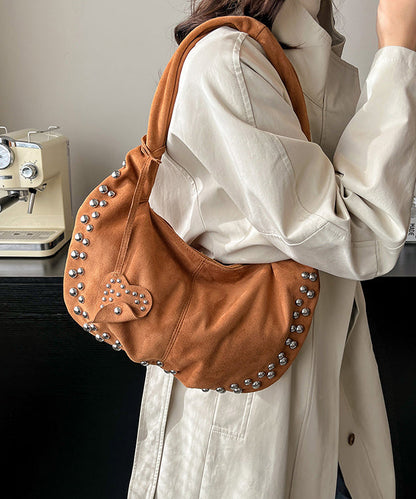 Bolso de mano elegante y duradero de piel sintética con remaches rojos