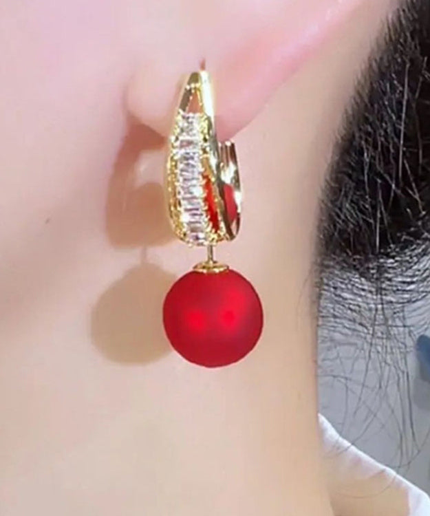 Elegantes pendientes colgantes de plata de ley roja con circonitas doradas y perlas