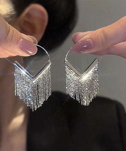 Edle Tropfenohrringe aus Seide, Metall, Zirkonia und Diamanten mit Quaste