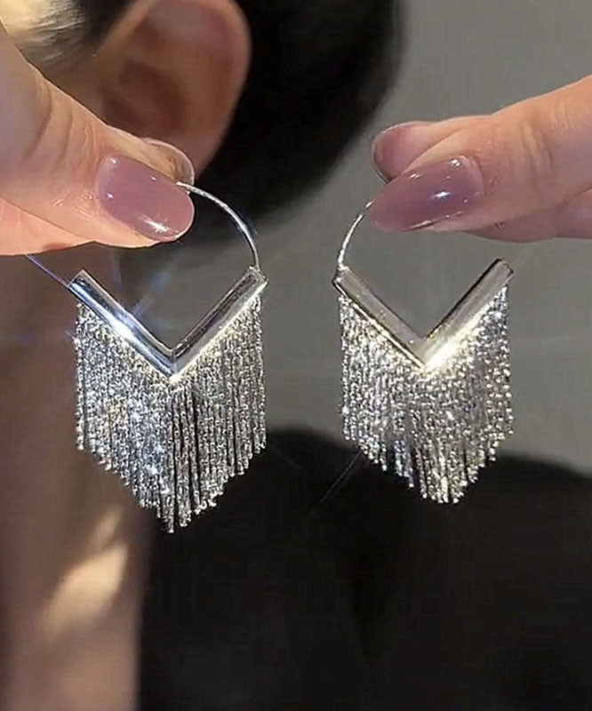 Edle Tropfenohrringe aus Seide, Metall, Zirkonia und Diamanten mit Quaste