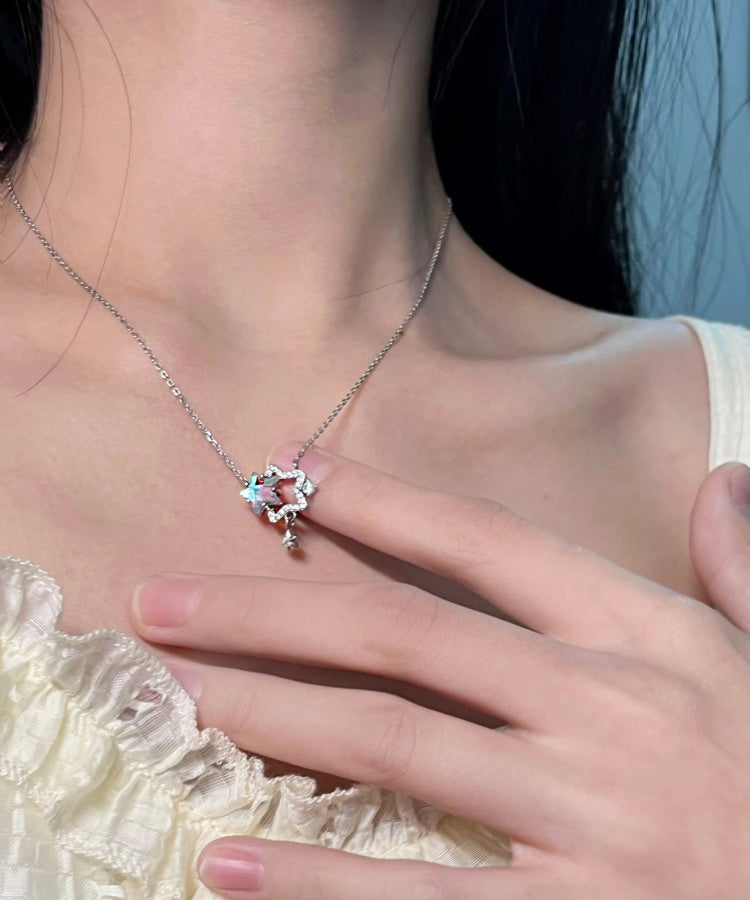 Collar con colgante de estrellas huecas y elegante plata de ley con circonitas esmaltadas en color