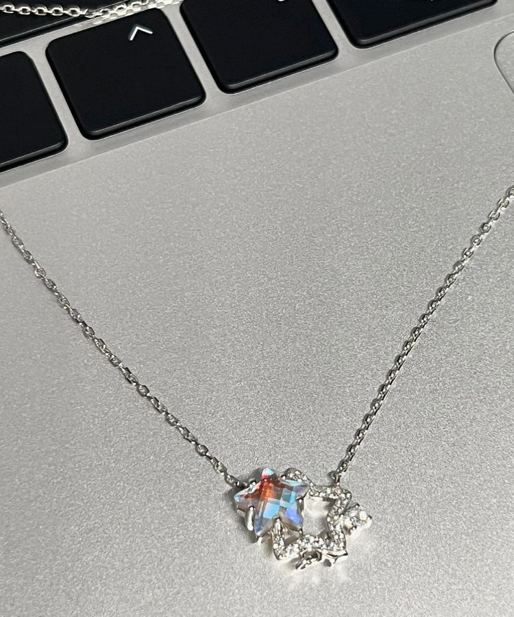 Collar con colgante de estrellas huecas y elegante plata de ley con circonitas esmaltadas en color