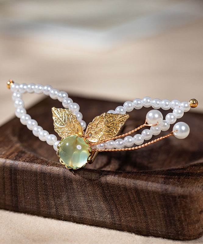 Horquilla con borla de resina y perla de aleación blanca elegante