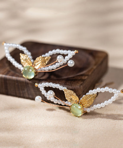 Horquilla con borla de resina y perla de aleación blanca elegante