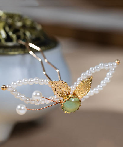 Horquilla con borla de resina y perla de aleación blanca elegante