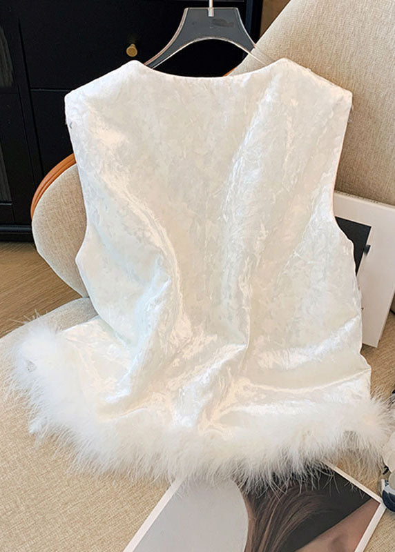 Chaleco elegante de piel peluda bordada en blanco con patchwork esponjoso para otoño