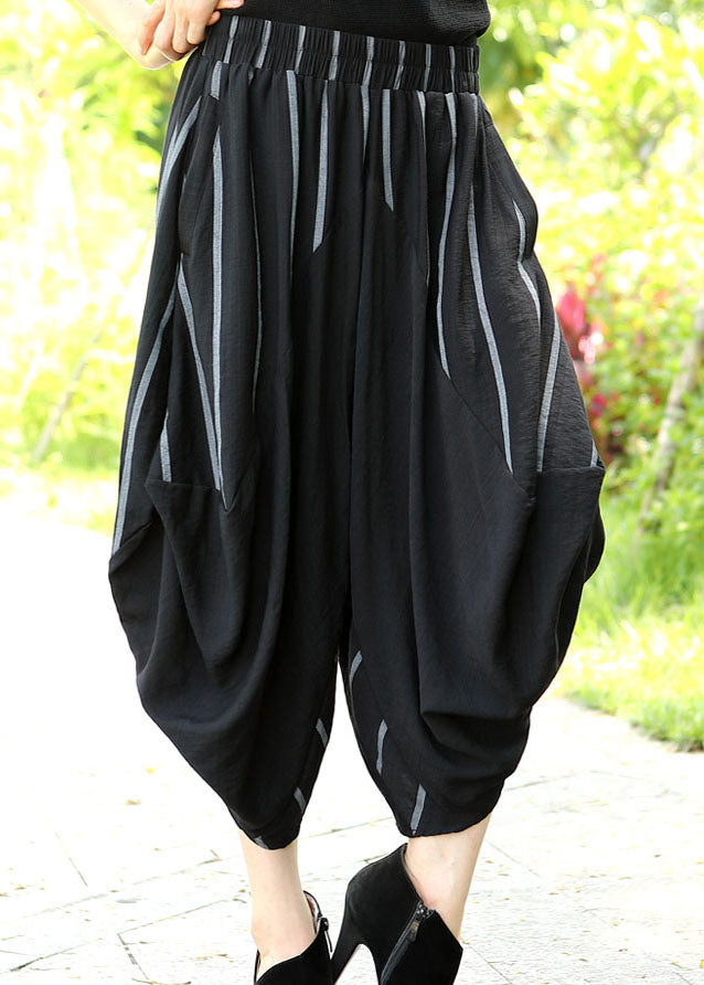 Bequeme schwarze, gestreifte Patchwork-Crop-Spring-Hose mit asymmetrischem Design