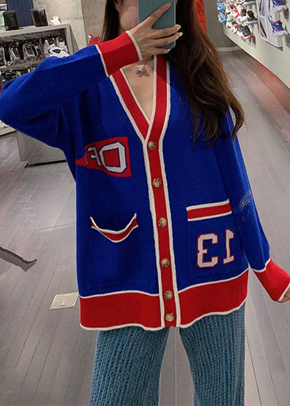 Bequemer blauer, lockerer Patchwork-Strickpullover mit Knopftaschen für den Herbst