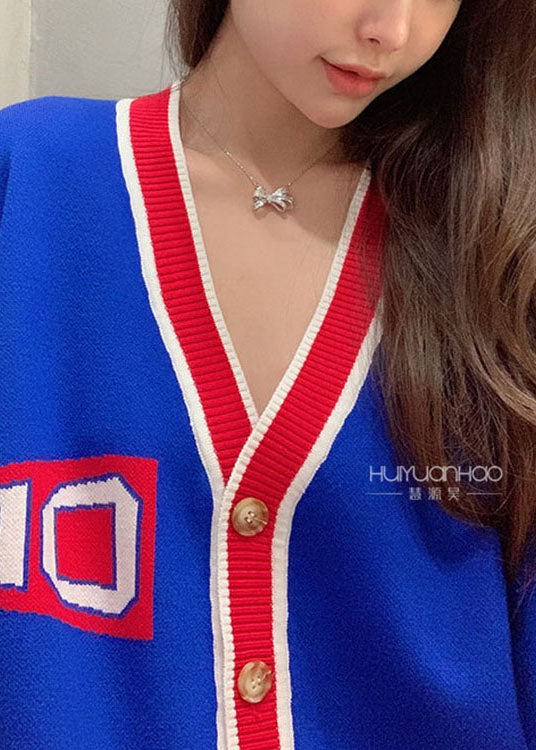 Bequemer blauer, lockerer Patchwork-Strickpullover mit Knopftaschen für den Herbst