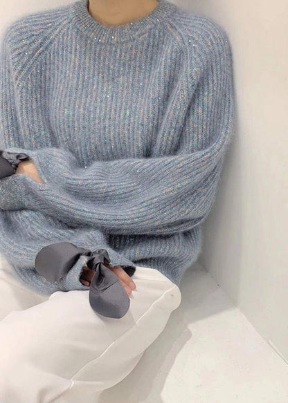 Kuscheliger, himmelblauer Pailletten-Oversize-Strickpullover für den Winter