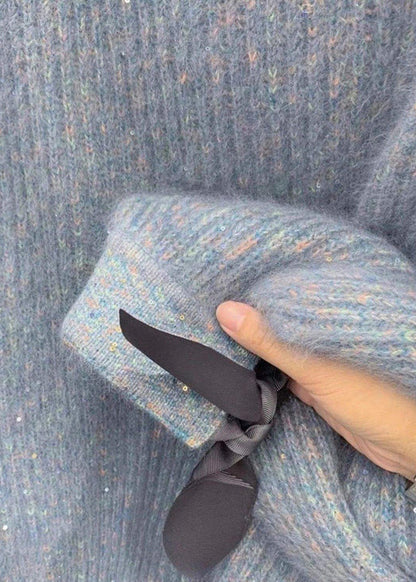 Kuscheliger, himmelblauer Pailletten-Oversize-Strickpullover für den Winter