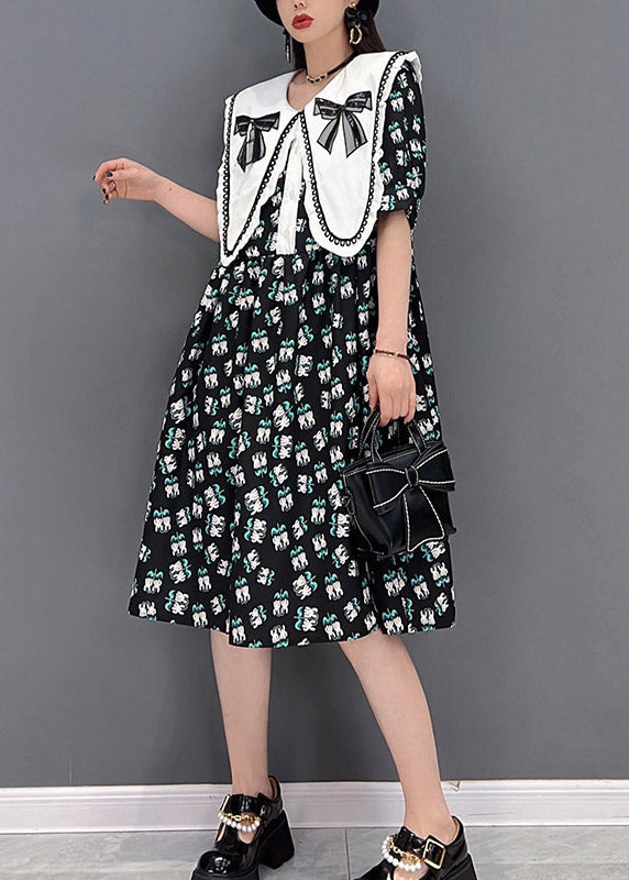 Süße schwarze Peter Pan Kragen Schleife Print Chiffon A-Linie Kleider Kurzarm