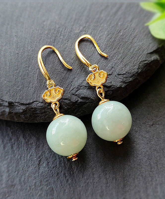 Lindos aretes colgantes de jade dorado en plata de ley verde claro