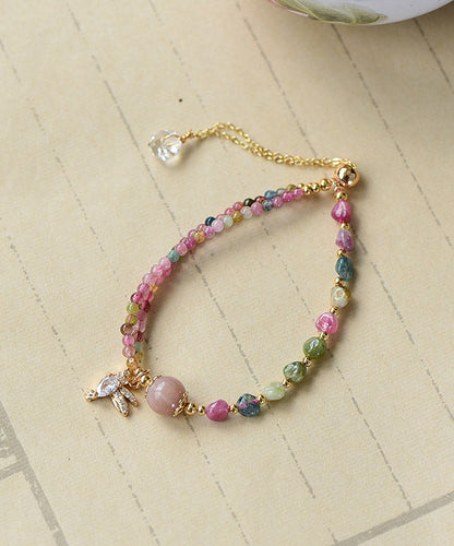 Bonita pulsera con dije de cristal de jade y circonita en oro rosa de 14 quilates