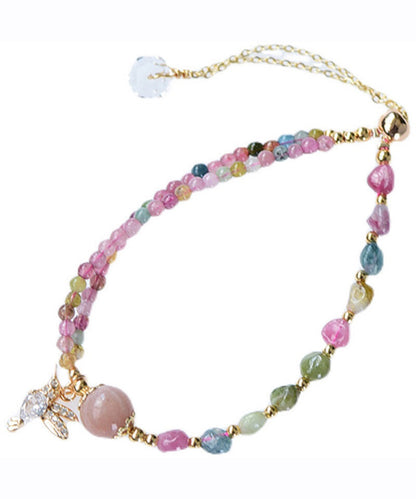 Bonita pulsera con dije de cristal de jade y circonita en oro rosa de 14 quilates