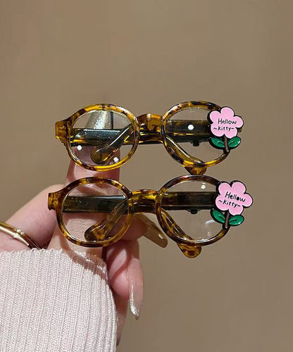 Bonitas gafas de acrílico rosa con diseño floral y horquilla para el pelo.