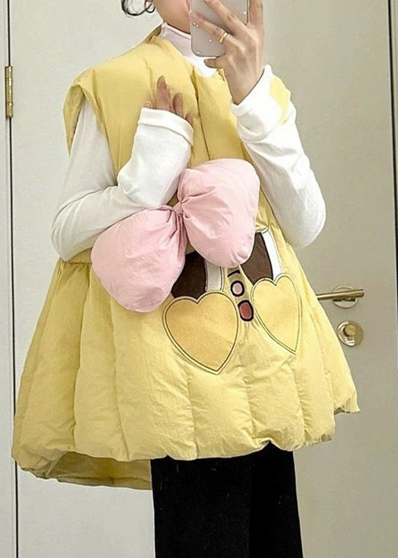 Niedliches zweiteiliges Set aus warmer Weste und T-Shirt mit rosa Schleifenmuster für den Winter