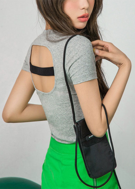 Bonita camiseta de manga corta con estampado de patchwork rosa y hueco