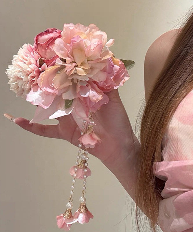 Niedliche Haarnadel mit rosa Pfingstrosenquaste