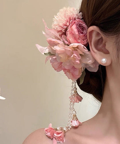 Niedliche Haarnadel mit rosa Pfingstrosenquaste