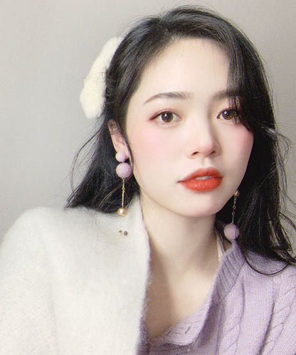 Lindos aretes colgantes de bola peluda de cristal dorado en plata esterlina morada