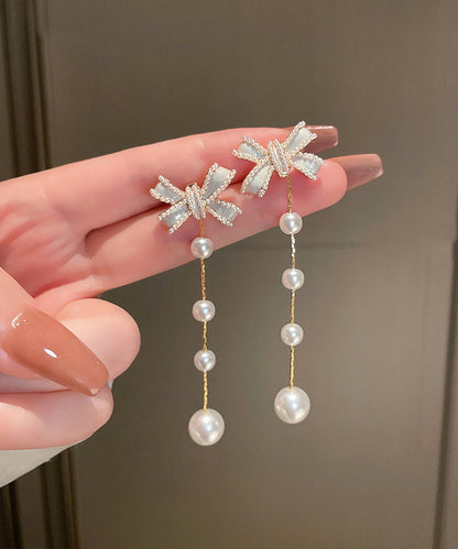 Lindos pendientes de borla con perla y lazo de aleación de plata esterlina blanca