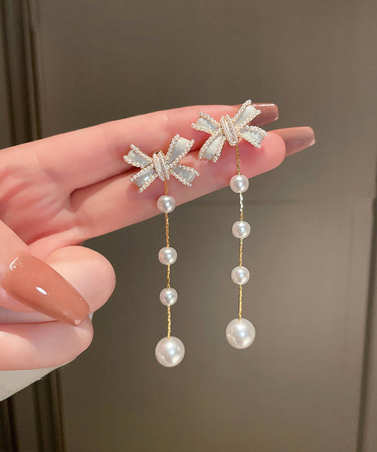 Lindos pendientes de borla con perla y lazo de aleación de plata esterlina blanca