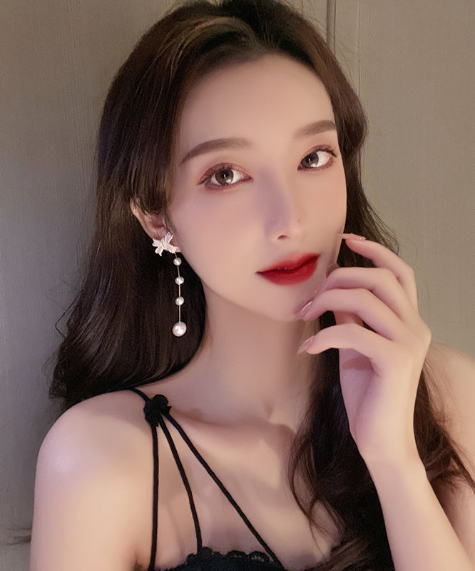 Lindos pendientes de borla con perla y lazo de aleación de plata esterlina blanca